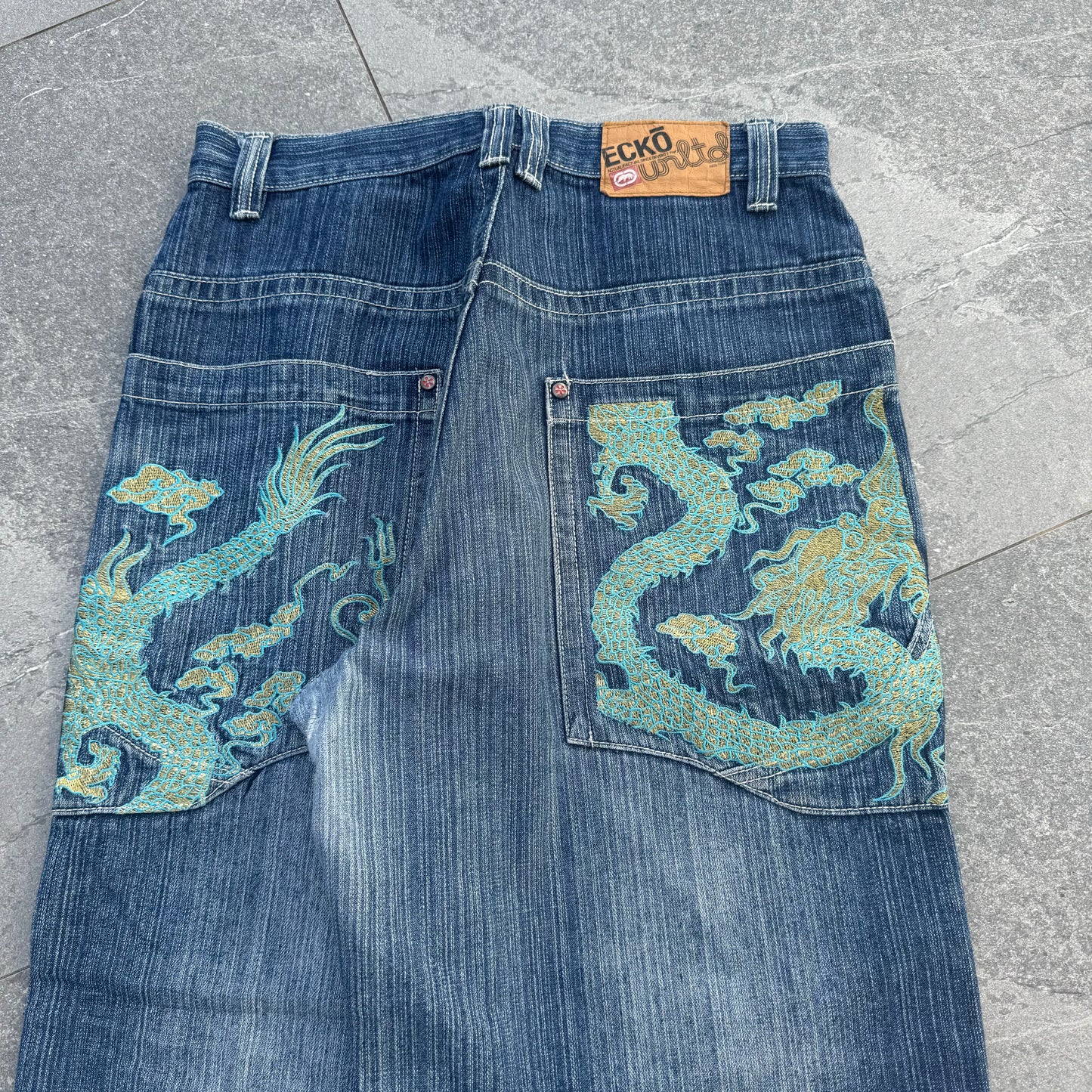 ecko embroidered jeans - 33x31”